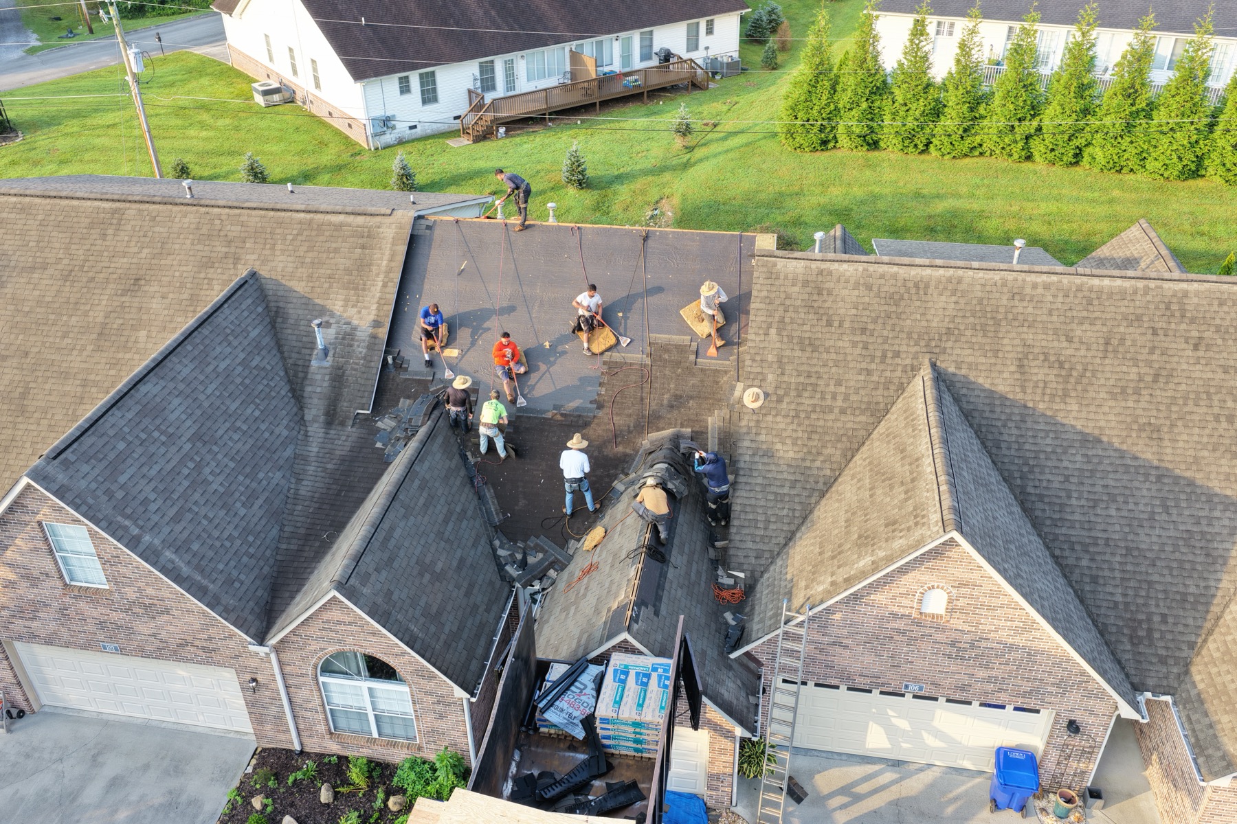 Brogdon crew replacing a home's roof, from tear-off to new shingles